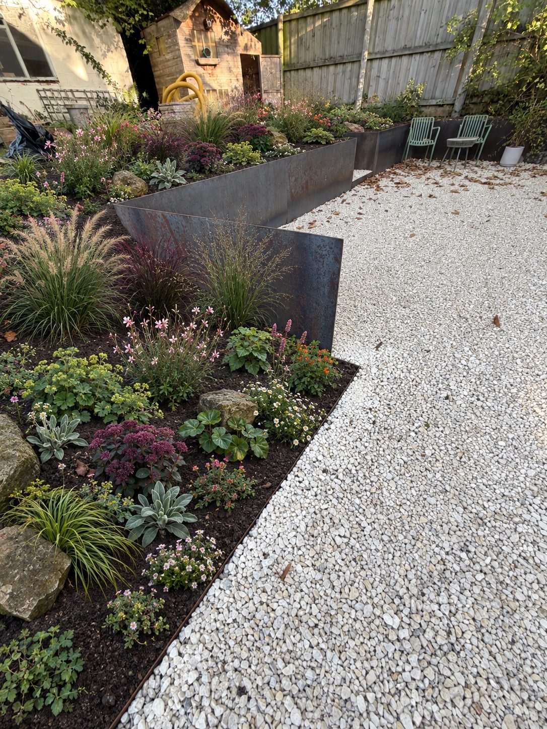 Corten steel retaining wall with gravel and planting – Brook Garden, Brook, Kent