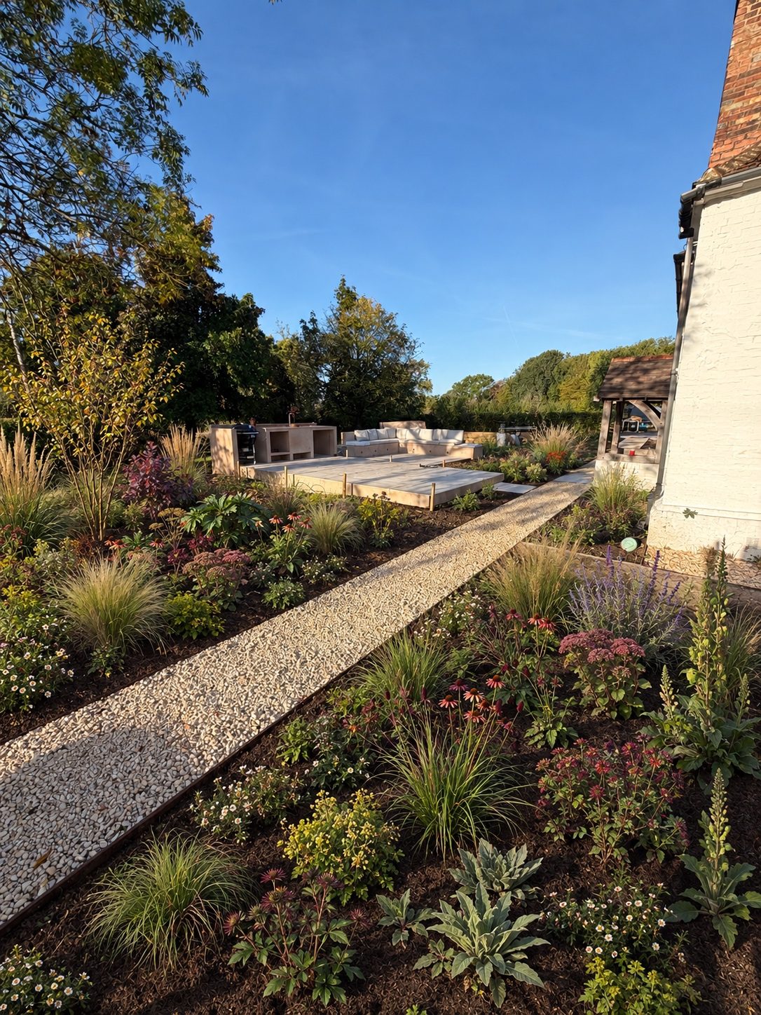 Gravel path through prairie planting – Brook Garden, Brook, Kent
