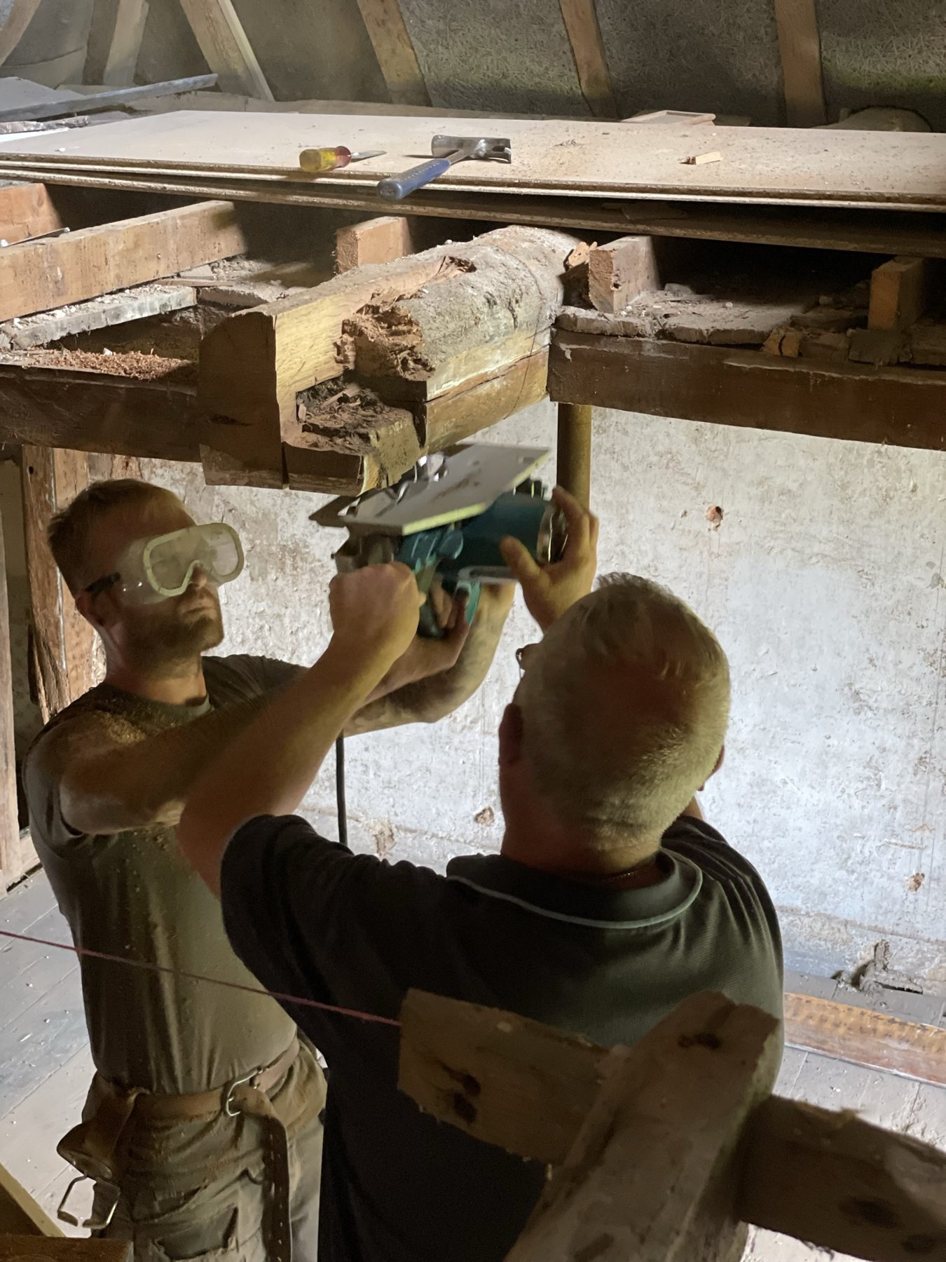 Carpenters repairing old roof timbers – USFEW carpentry, Kent