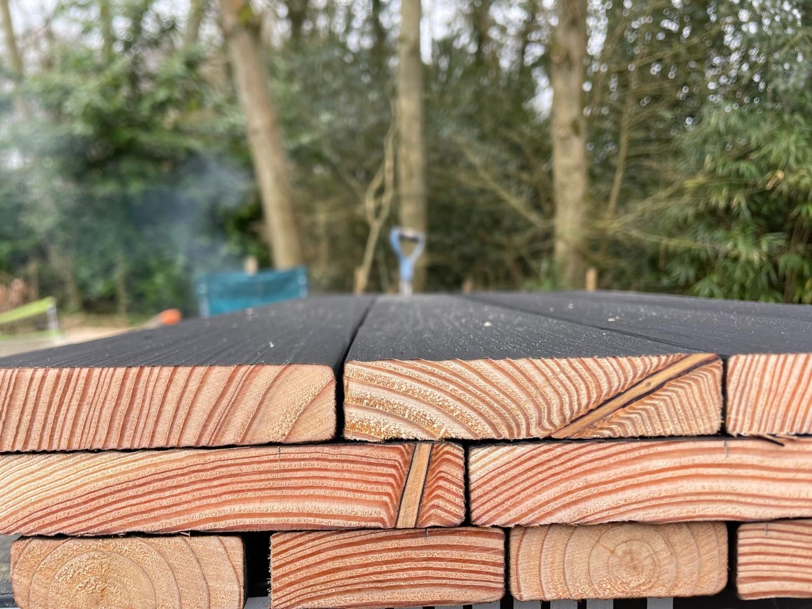 End grain of stacked timber deck boards – USFEW carpentry, Kent