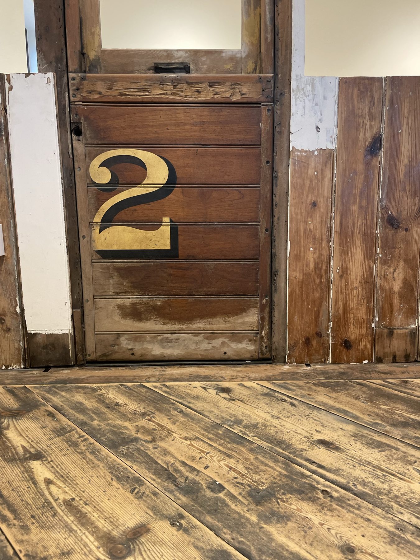 Reclaimed numbered door and wide boarded floor – USFEW carpentry, Kent