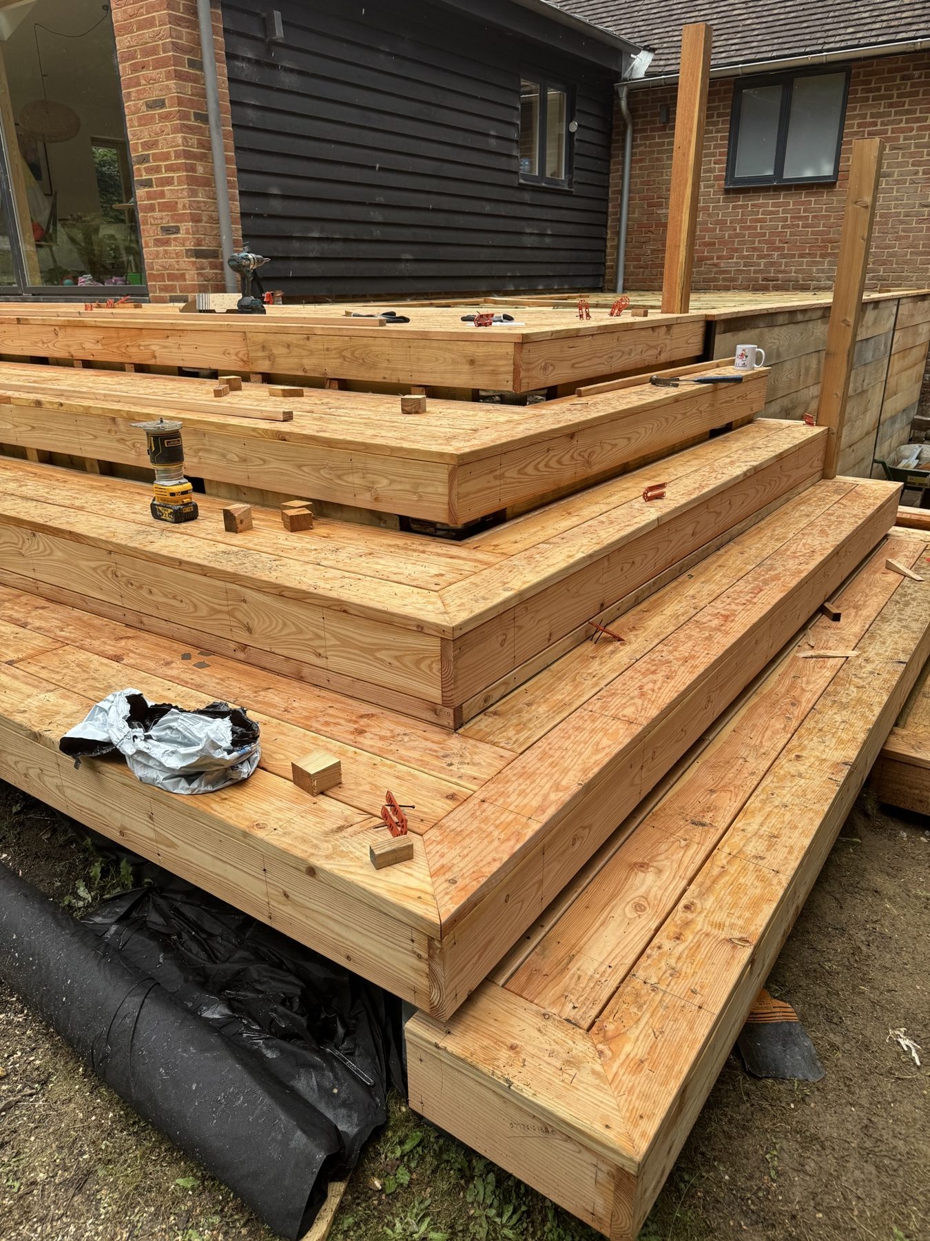Wide timber deck steps under construction – USFEW carpentry, Kent